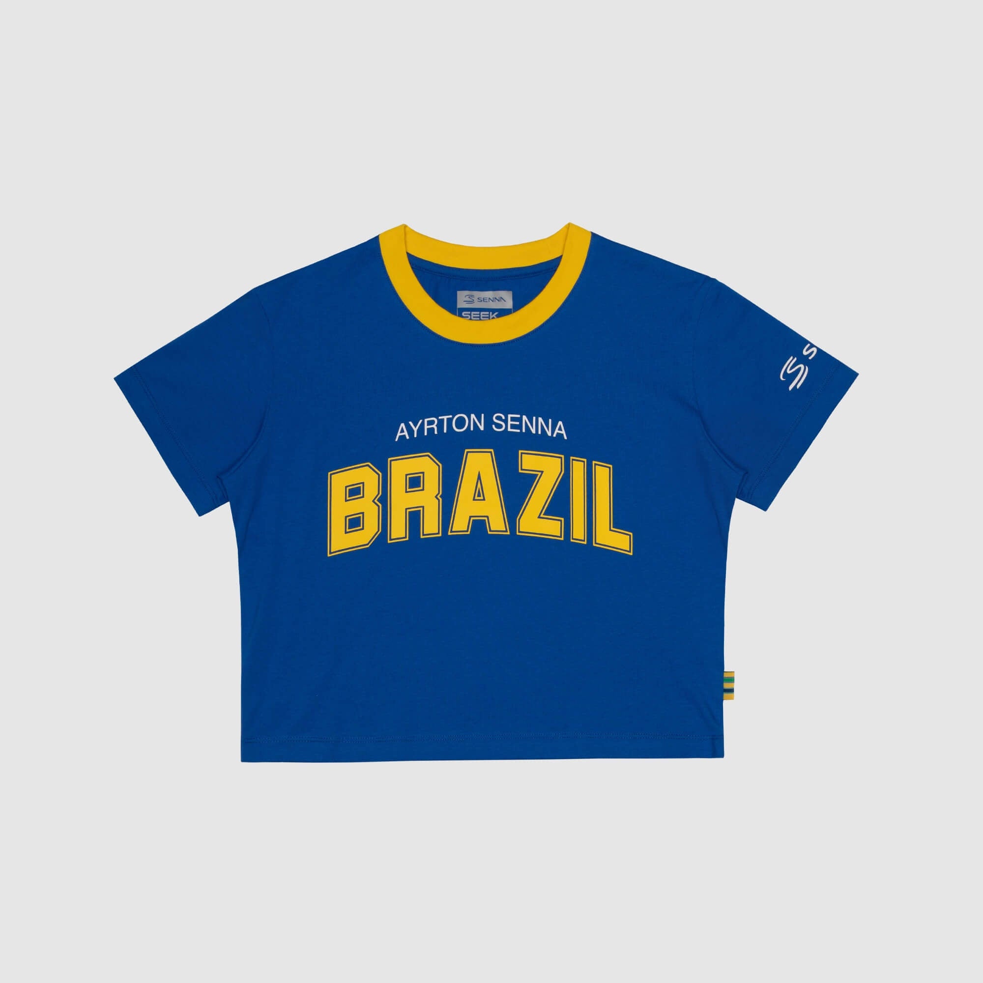 Blue women's crop t-shirt with 'Ayrton Senna Brazil' text on a light gray background