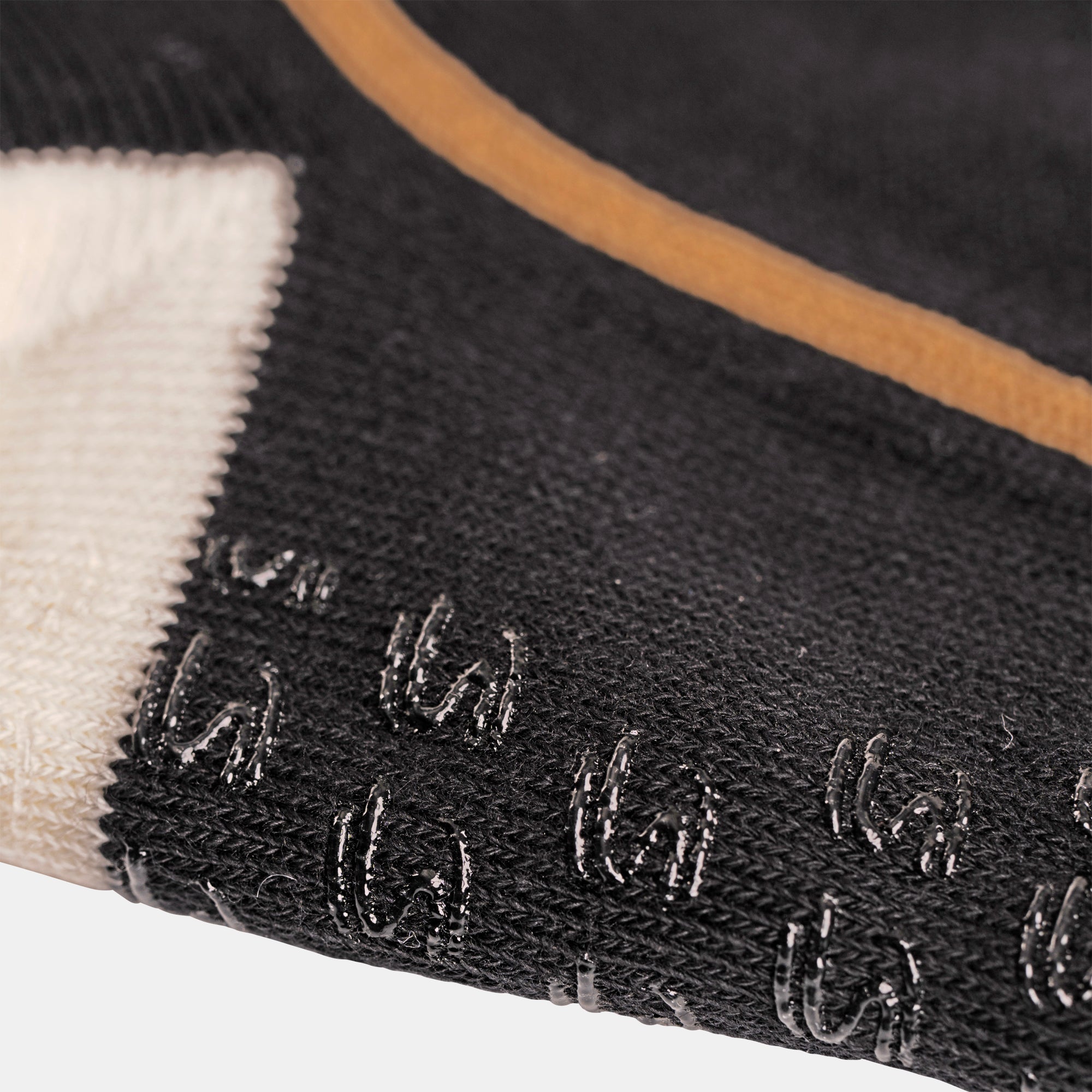 Close-up of Senna x Team Lotus crew sock featuring gel gripper sole