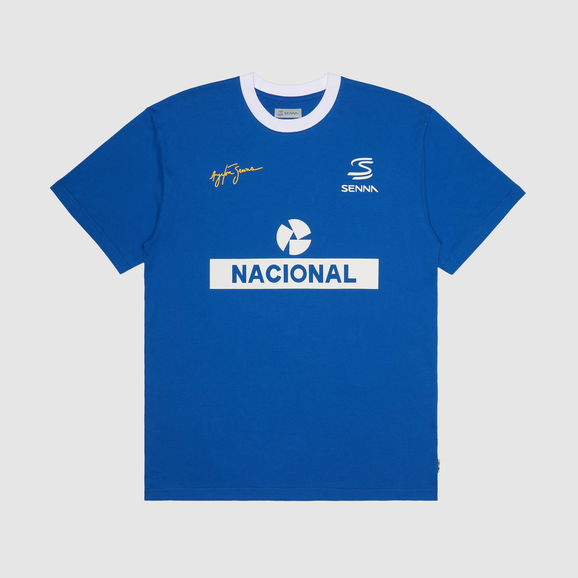 Iconic nacional blue x senna t-shirt with white accents and logos on a light gray background